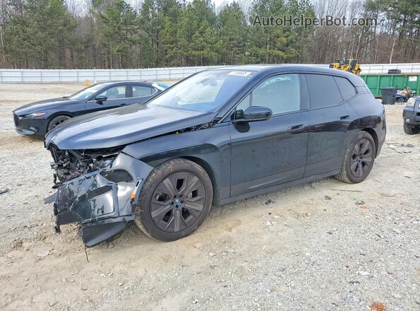 WB523CF09PCL65340 2023 BMW IX Black Vista tres cuartos delantera izquierda