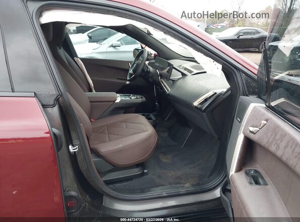 WB523CF09SCS38080 2025 BMW IX Burgundy Widok wnętrza z przodu