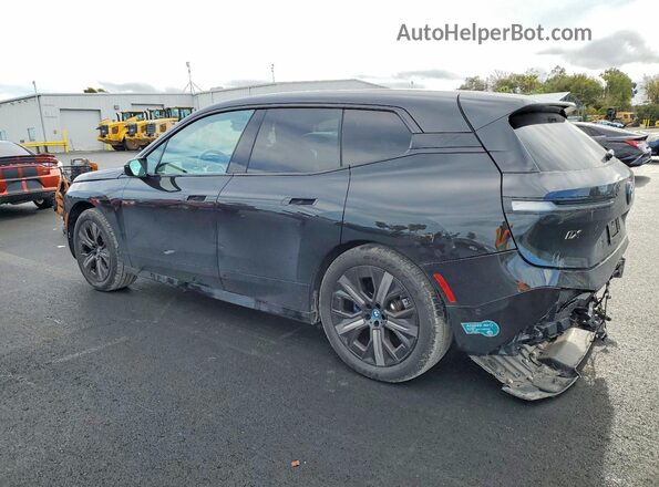 WB533CF04SCT56283 2025 BMW IX Charcoal უკანა მარცხენა