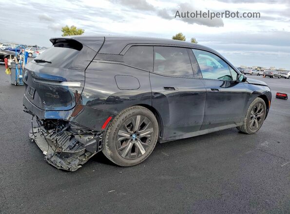 WB533CF04SCT56283 2025 BMW IX Charcoal უკანა მარჯვენა