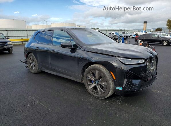 WB533CF04SCT56283 2025 BMW IX Charcoal წინა მარჯვენა