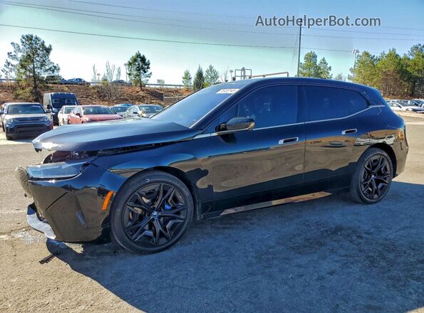 WB533CF0XPCL96472 2023 BMW IX Черный Передняя левая четверть