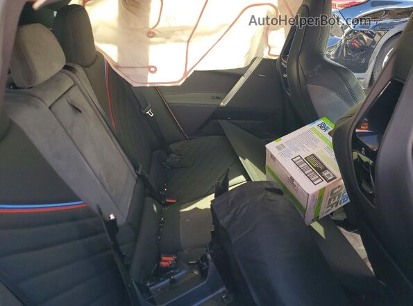 WB543CF03TCV15963 2026 BMW IX White Vista interior trasera