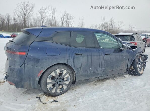 WB543CF07TCV41501 2026 BMW IX Blue უკანა მარჯვენა