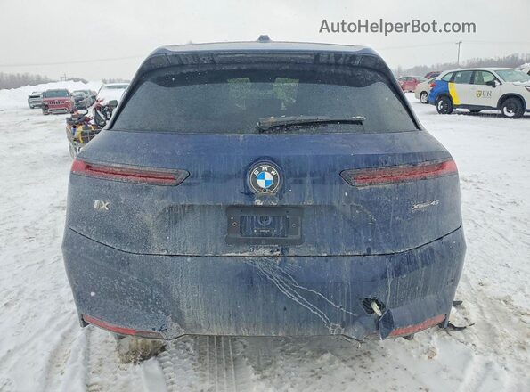 WB543CF07TCV41501 2026 BMW IX Blue უკანა ხედი