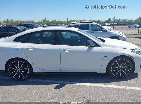 WBA13AL01L7F88256 2020 BMW OTHER White Вид задньої частини салону
