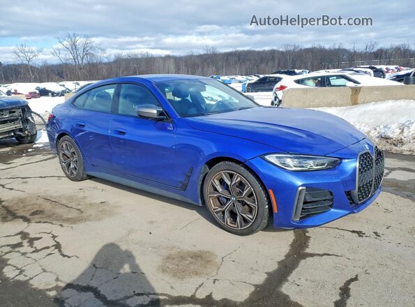 WBA13AW01PFN98466 2023 BMW M4 Синий Передняя правая четверть
