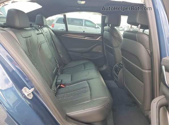 WBA13BK09PCM32189 2023 BMW M5 Blue უკანა სავარძლების ხედი