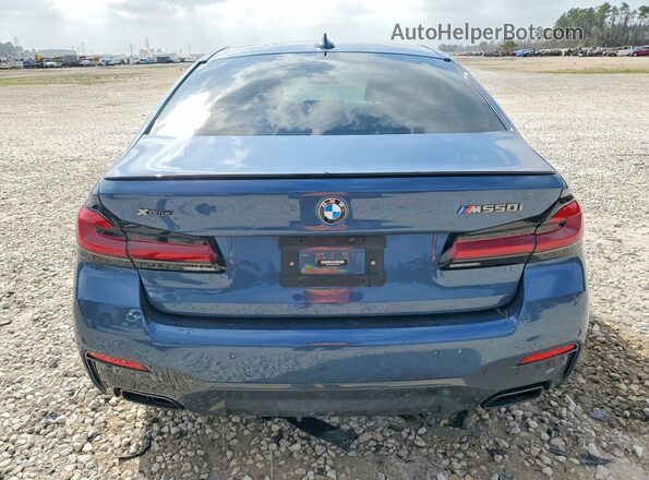 WBA13BK09PCM32189 2023 BMW M5 Blue უკანა ხედი