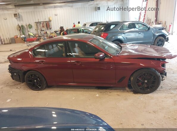 WBA13BK09PCN34382 2023 BMW M5 Красный Вид задней части салона
