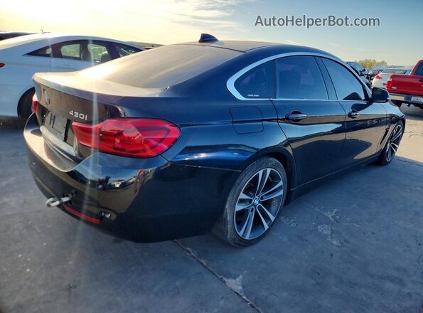 WBA4J1C05LBU68022 2020 BMW OTHER Black Rear right