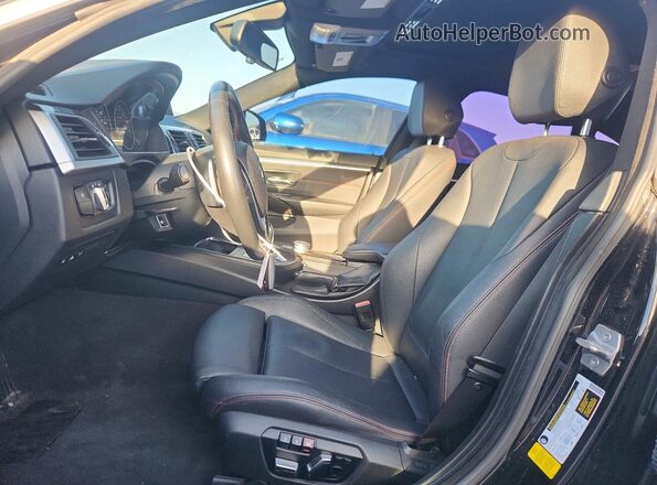 WBA4J1C05LBU68022 2020 BMW OTHER Black Front interior view