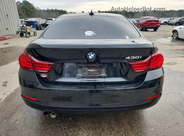 WBA4J1C0XLCE12915 2020 BMW OTHER Black Вид ззаду