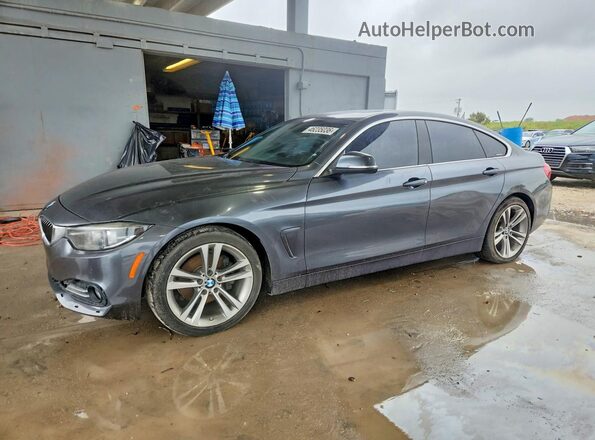 WBA4J1C57KBM12898 2019 BMW OTHER Серый Передняя левая четверть