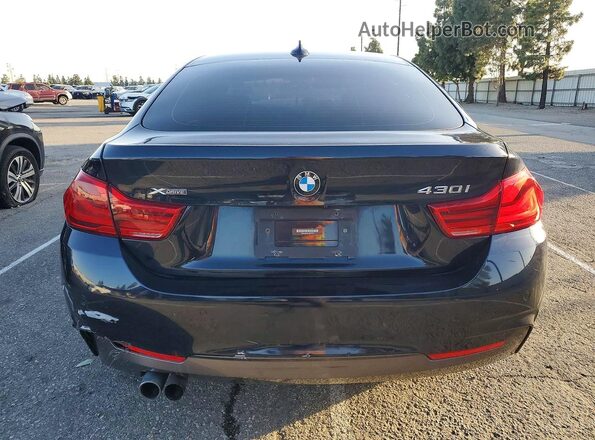 WBA4J3C50JBB97359 2018 BMW OTHER Черный Вид сзади