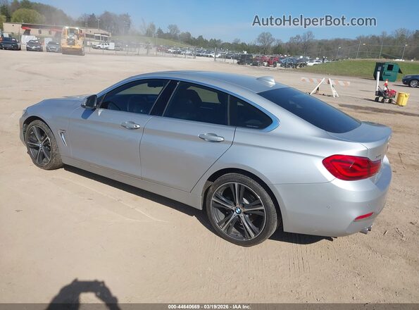 WBA4J3C50KBL06644 2019 BMW OTHER Silver Tył lewy