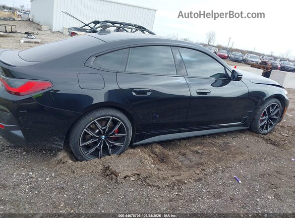 WBA73AV01RFS77784 2024 BMW OTHER Black Սալոնի հետևի տեսք