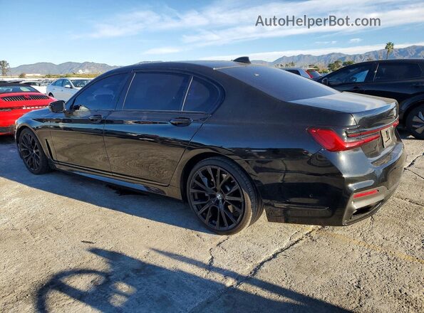 WBA7T2C02NCH01013 2022 BMW OTHER Черный Задняя левая четверть
