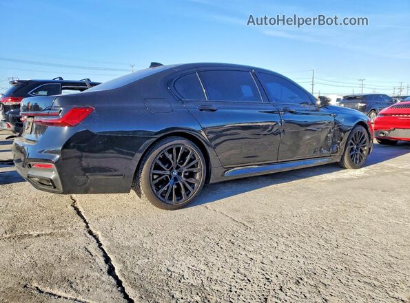 WBA7T2C02NCH01013 2022 BMW OTHER Черный Задняя правая четверть