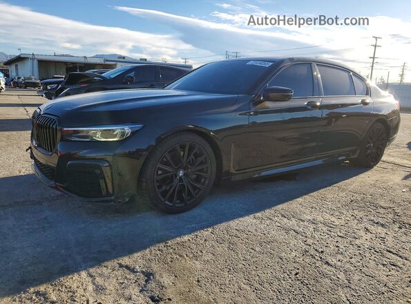 WBA7T2C02NCH01013 2022 BMW OTHER Черный Передняя левая четверть
