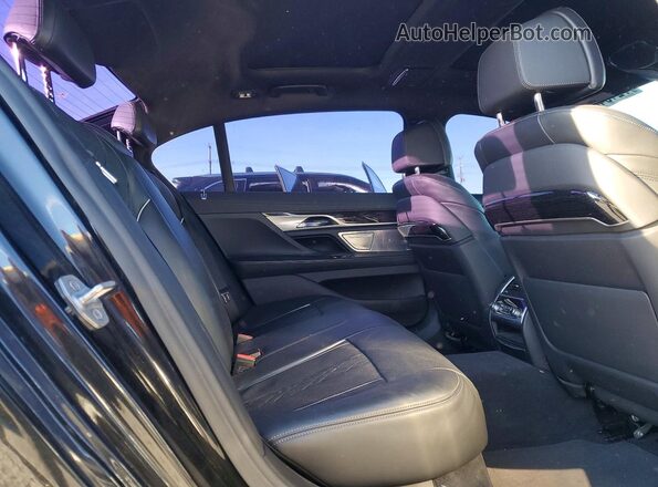 WBA7T2C02NCH01013 2022 BMW OTHER Черный Вид задних сидений