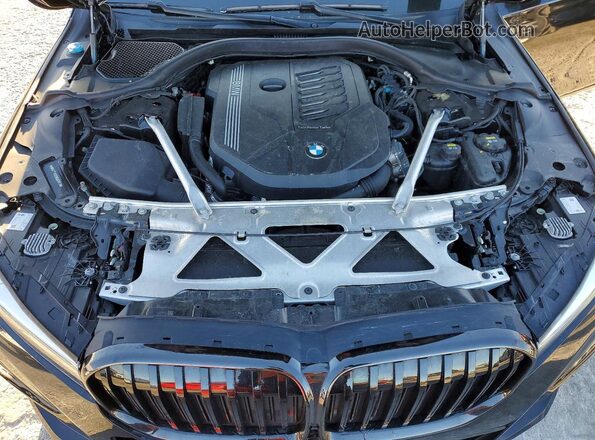 WBA7T2C02NCH01013 2022 BMW OTHER Черный Вид задней части салона