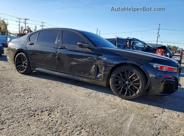 WBA7T2C02NCH01013 2022 BMW OTHER Черный Передняя правая четверть