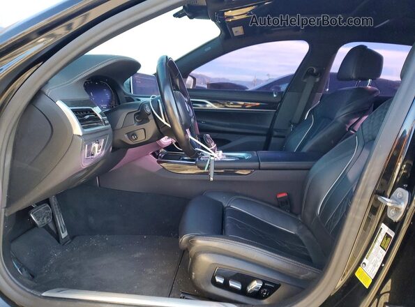 WBA7T2C02NCH01013 2022 BMW OTHER Черный Вид салона спереди