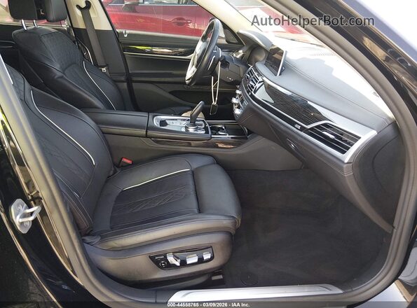 WBA7T2C06NCK54344 2022 BMW OTHER Черный Вид салона спереди