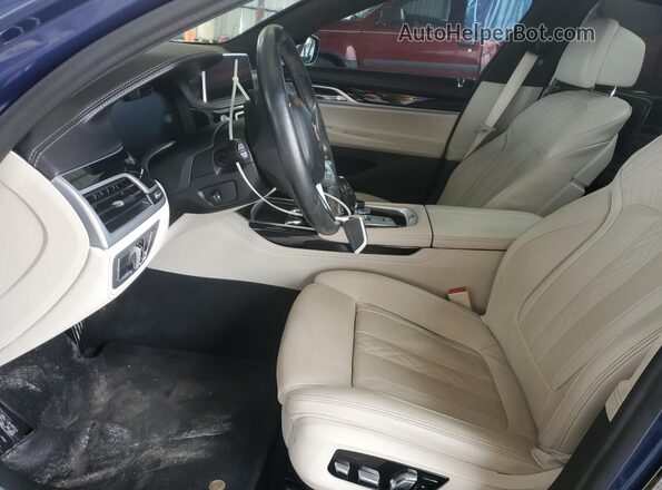 WBA7U2C18MCE85799 2021 BMW OTHER Blue Вид салону спереду