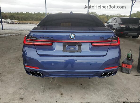 WBA7U2C18MCE85799 2021 BMW OTHER Blue Вид ззаду