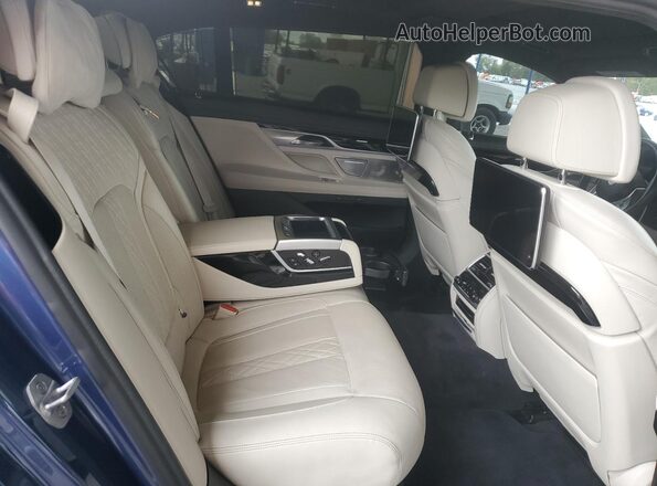 WBA7U2C18MCE85799 2021 BMW OTHER Blue Вид задніх сидінь