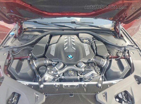 WBAGV8C0XSCT85219 2025 BMW M8 Burgundy Вид задньої частини салону
