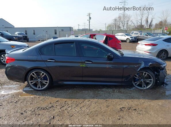 WBAJB9C54JB287372 2018 BMW 5 SERIES Gray Widok wnętrza z tyłu