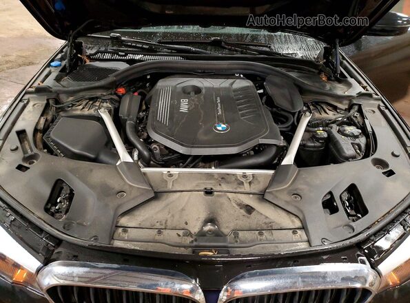 WBAJE7C56KWW21813 2019 BMW OTHER Charcoal Widok wnętrza z tyłu