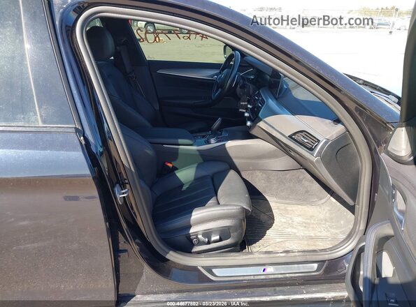 WBAJS3C00LCE10571 2020 BMW OTHER Black Vista interior delantera