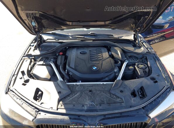 WBAJS3C00LCE10571 2020 BMW OTHER Black Vista trasera
