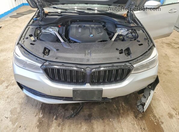 WBAJV6C54JBK07638 2018 BMW OTHER Серебряный Вид задней части салона