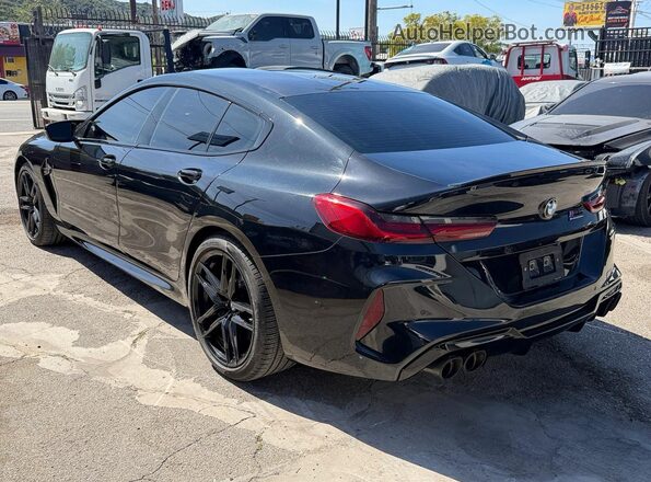 WBSGV0C02SCT39039 2025 BMW M8 Черный Передняя правая четверть