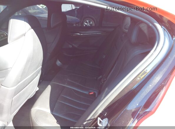 WBSJF0C57JB283411 2018 BMW M5 Orange Widok naklejki z numerem VIN