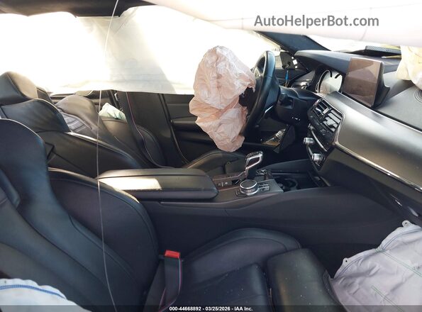 WBSJF0C58KB448397 2019 BMW M5 Серый Вид салона спереди