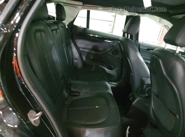 WBXHT3C32GP884450 2016 BMW X1 Black Widok tylnych siedzeń