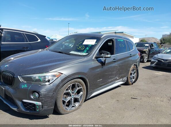 WBXHT3C34G5E49430 2016 BMW X1 Серый Вид спереди