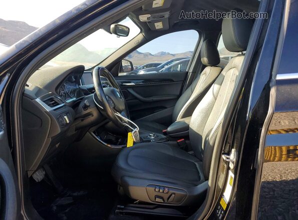 WBXHT3C34G5E50335 2016 BMW X1 Black Widok wnętrza z przodu