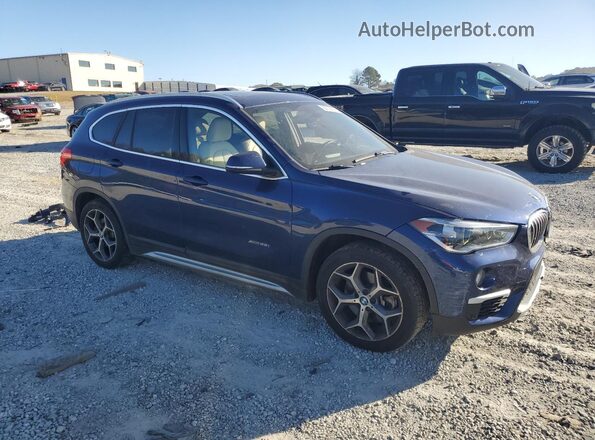 WBXHT3C36H5F75127 2017 BMW X1 Синий Передняя правая четверть