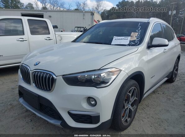 WBXHT3C37H5F70955 2017 BMW X1 Белый Передняя левая четверть
