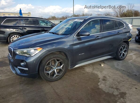 WBXHT3C38G5F66332 2016 BMW X1 Gray Vista tres cuartos delantera izquierda