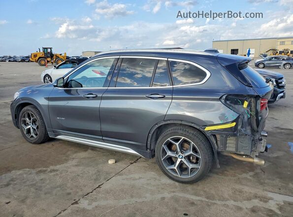 WBXHT3C38G5F66332 2016 BMW X1 Gray Trasero izquierdo