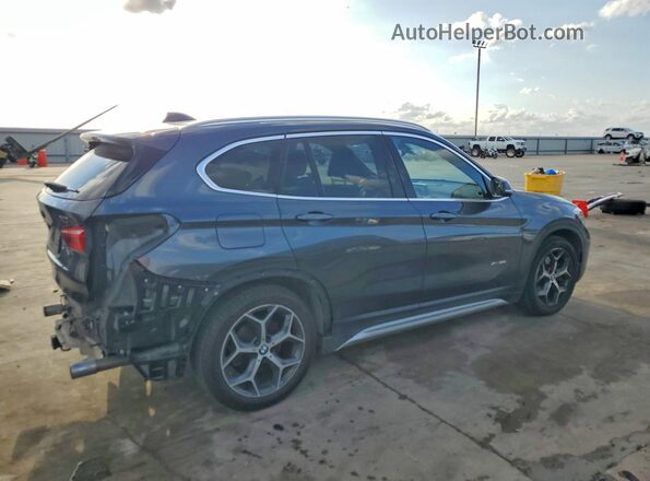 WBXHT3C38G5F66332 2016 BMW X1 Gray Trasero derecho