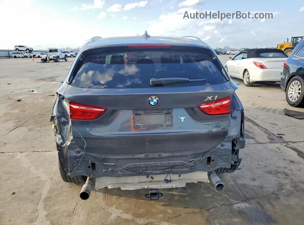 WBXHT3C38G5F66332 2016 BMW X1 Gray Vista trasera
